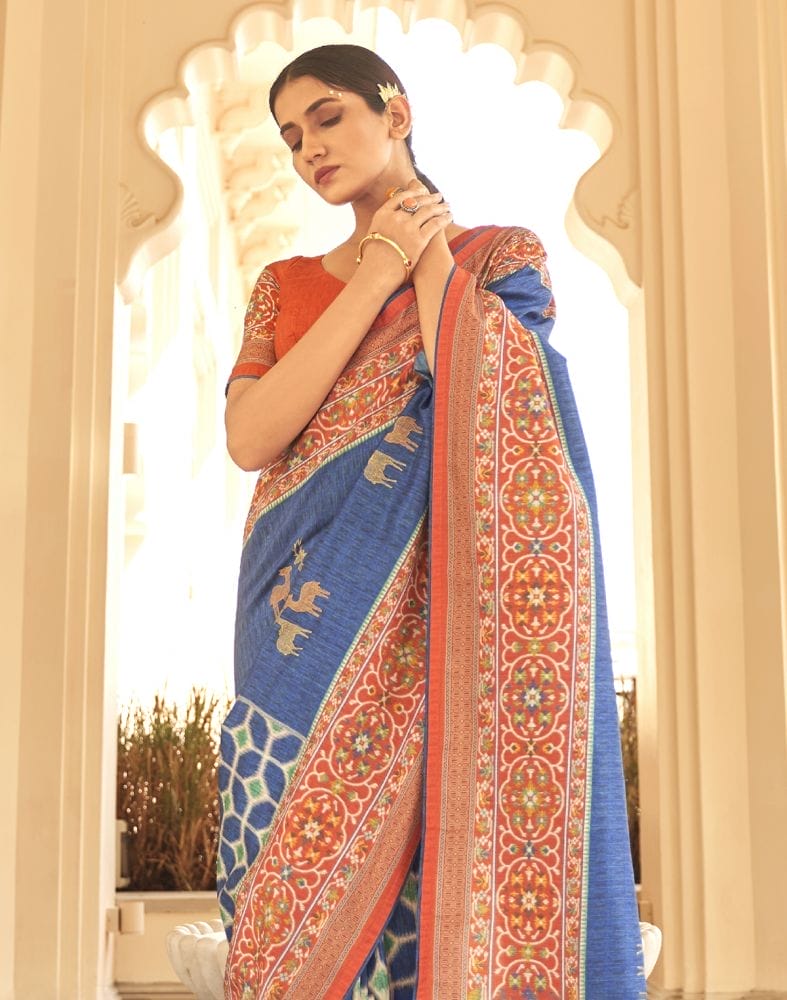 Collection of Blue Ikat Print Dola Silk Fabric Saree in a gallery layout