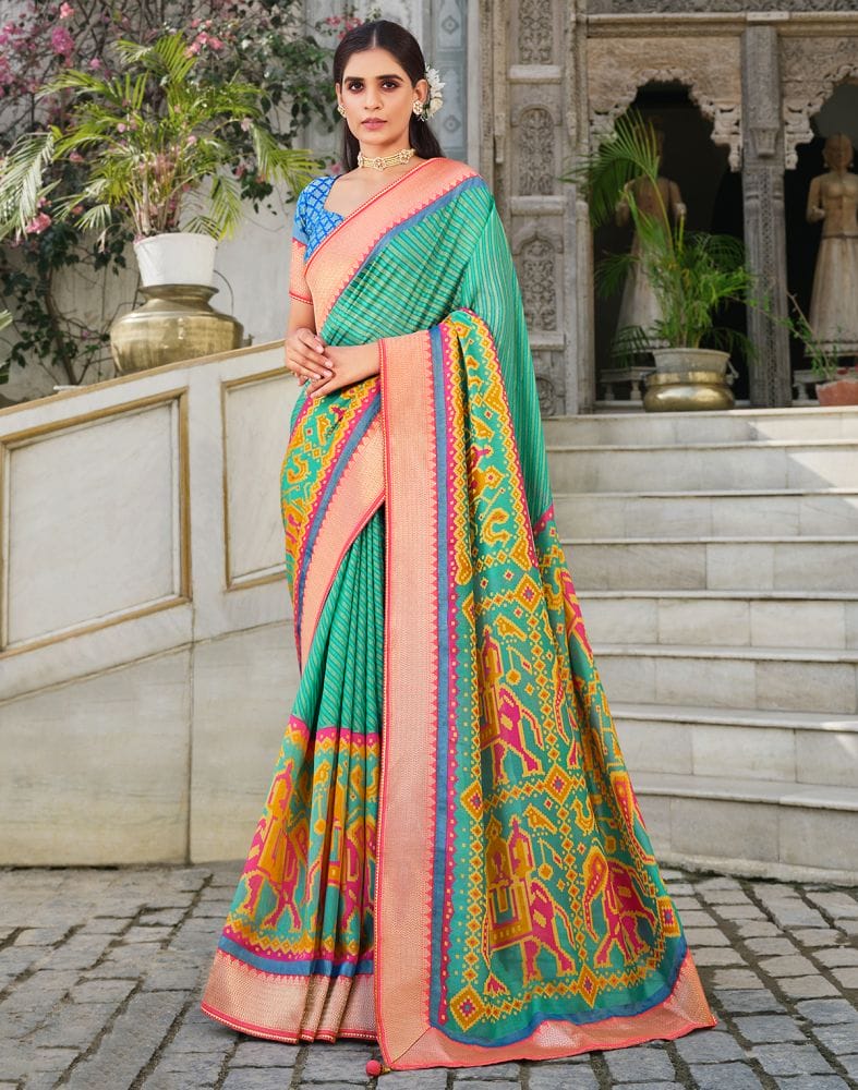 Collection of Brasso Pattern Sea Green Coloured Saree in a gallery layout