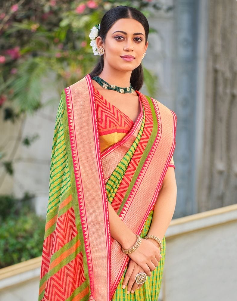 Collection of Parrot Green Stripes Pattern Brasso Fabric Saree in a gallery layout