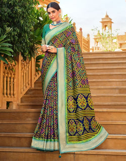 Collection of Green Geometric Brasso Fabric Saree in a gallery layout