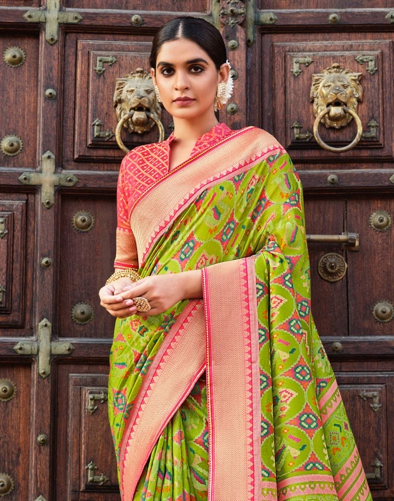 Collection of Parrot Green Brasso Fancy Saree in a gallery layout