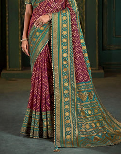 Collection of Maroon Geometric Print Patola Saree in a gallery layout