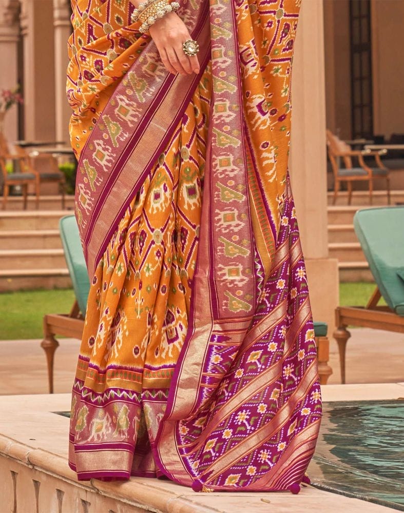 Collection of Mustard and Pink Ikat Print Patola Silk Saree in a gallery layout