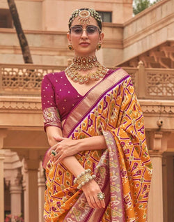 Collection of Mustard and Pink Ikat Print Patola Silk Saree in a gallery layout