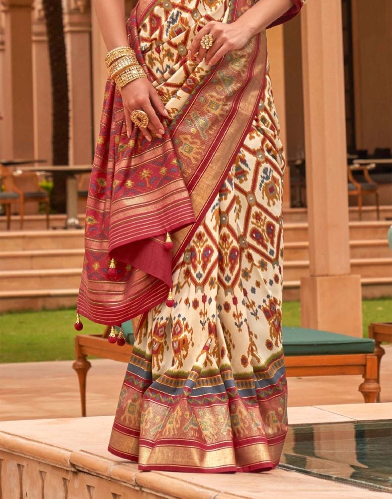 Collection of Ikat Print Cream Colour Patola Silk Saree in a gallery layout