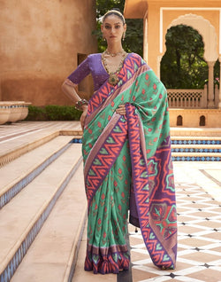 Collection of Beautiful Green Geometric Print Dola Silk Saree in a gallery layout