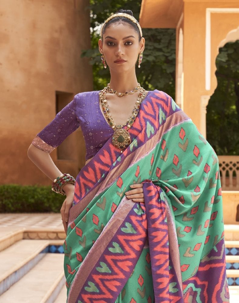 Collection of Beautiful Green Geometric Print Dola Silk Saree in a gallery layout