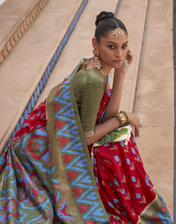 Collection of Red and Green Ikat Print Dola Silk Saree in a gallery layout