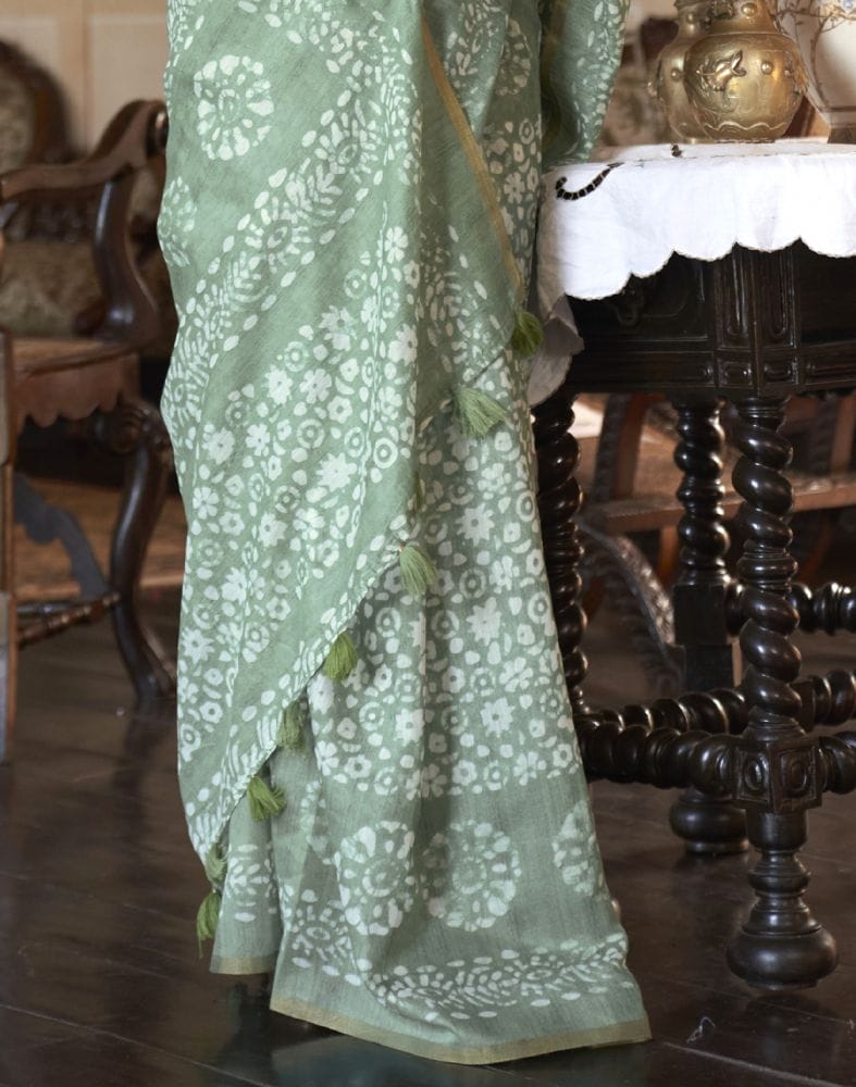 Collection of Emerald Light Green Floral Print Cotton Saree in a gallery layout