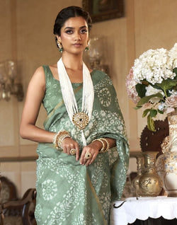 Collection of Emerald Light Green Floral Print Cotton Saree in a gallery layout