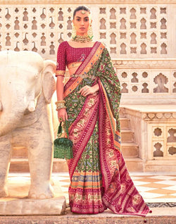 Collection of Mehendi Green Ikat Print Patola Saree in a gallery layout