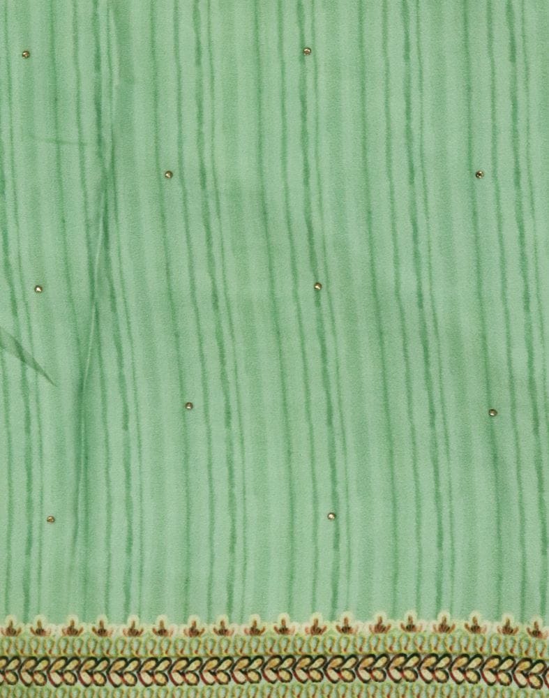 Collection of Green Striped Stones work Crape Saree in a gallery layout